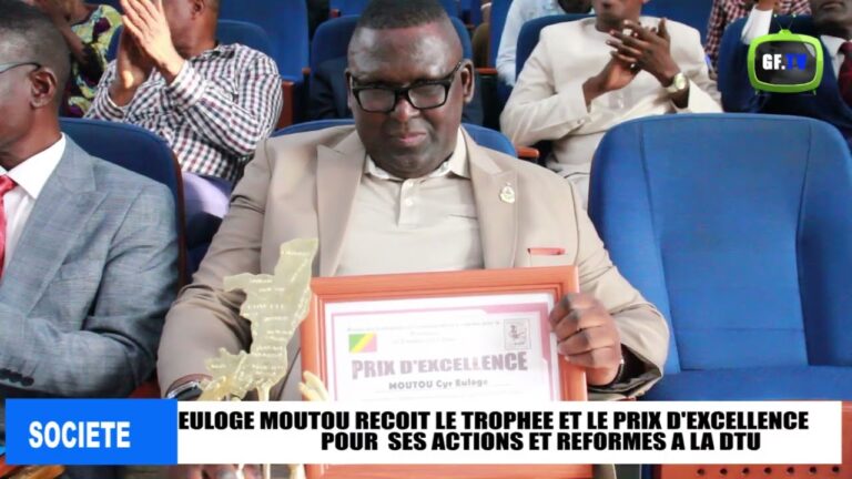 Cyr Euloge Moutou, directeur des transports urbains, reçoit le trophée et prix d'excellence le 9 mai 2026